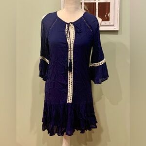 NW. Elegant Navy Blue Dress with White Accents and open shoulders.